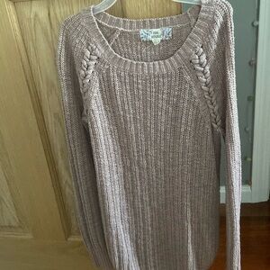 mauve sweater, comfortable material, usually looks best when styled with jeans